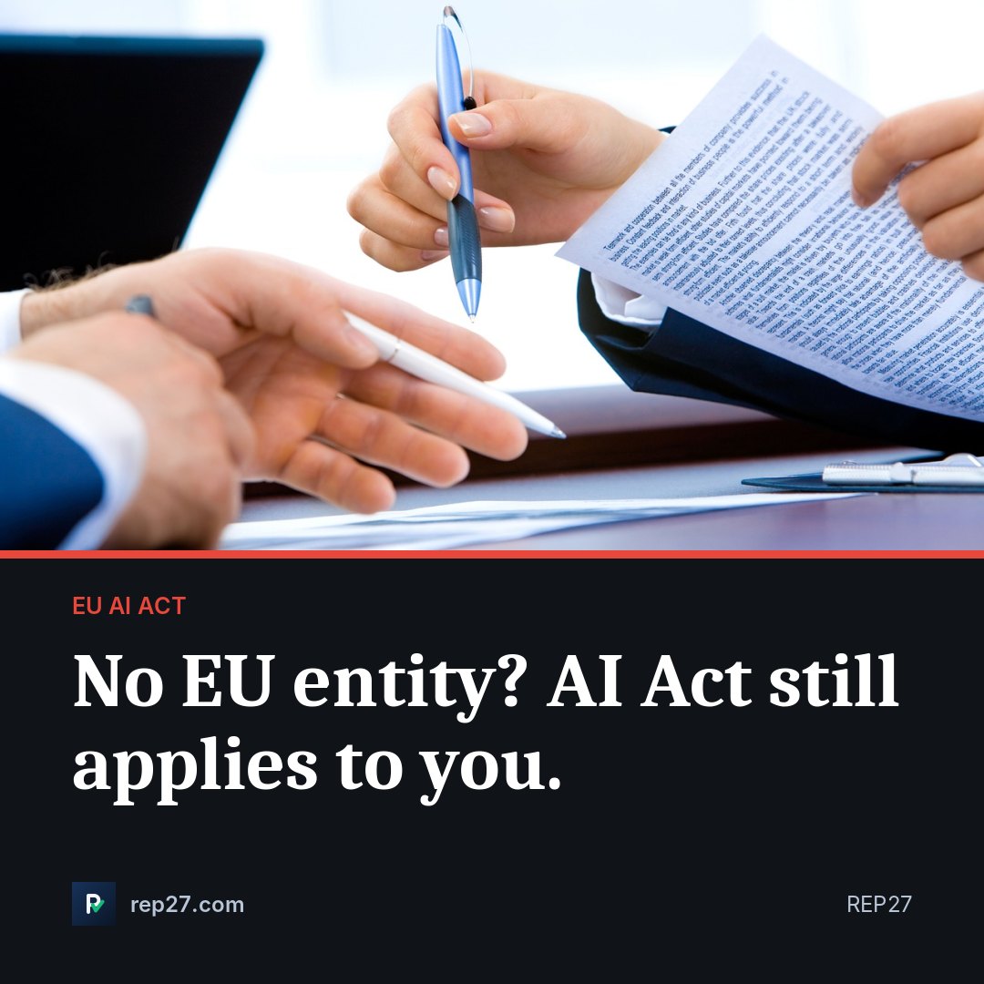 AI Act authorised representative obligation — document on desk showing EU regulation text, hands typing on laptop in background, office setting